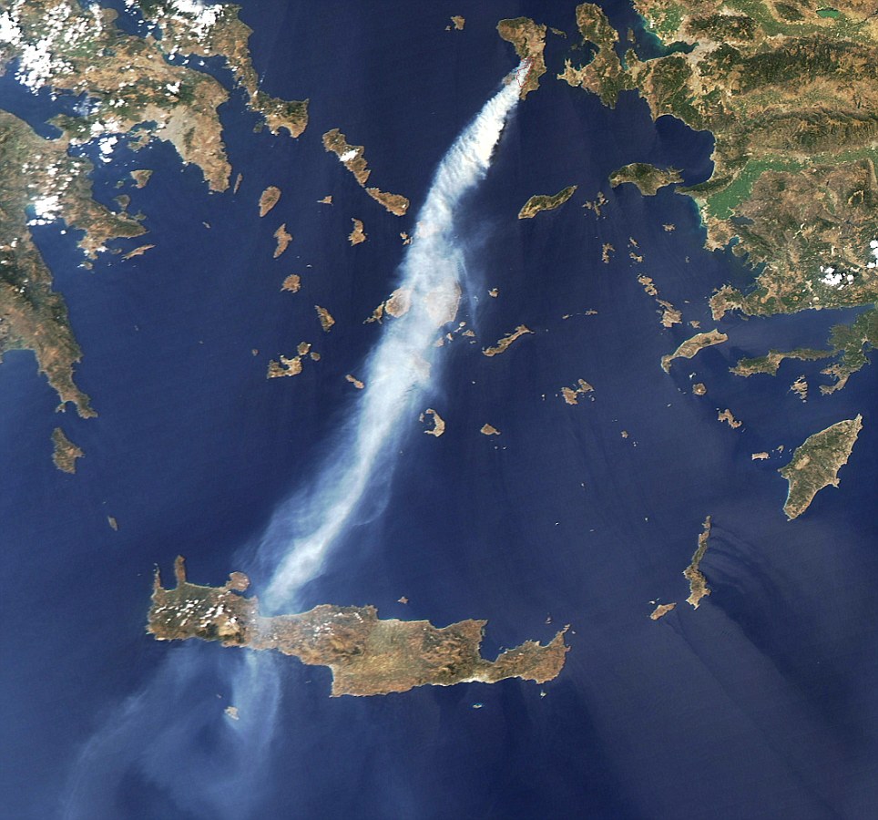 An image released by the Nasa Earth Observatory on August 22, 2012 and captured on August 18, 2012 by the Moderate Resolution Imaging Spectroradiometer (MODIS) on NASAs Aqua shows a thick plume of smoke sent by an intense wildfire that broke out on the Greek island of Chios. The red outlines approximate the locations of active blazes. In mid-August 2012, an intense wildfire broke out on the Greek island of Chios, sending a thick plume of smoke southward toward the island of Crete (Kriti). RESTRICTED TO EDITORIAL USE - MANDATORY CREDIT " AFP PHOTO - NASA EARTH OBSERVATORY" - NO MARKETING NO ADVERTISING CAMPAIGNS - DISTRIBUTED AS A SERVICE TO CLIENTS-/AFP/GettyImages